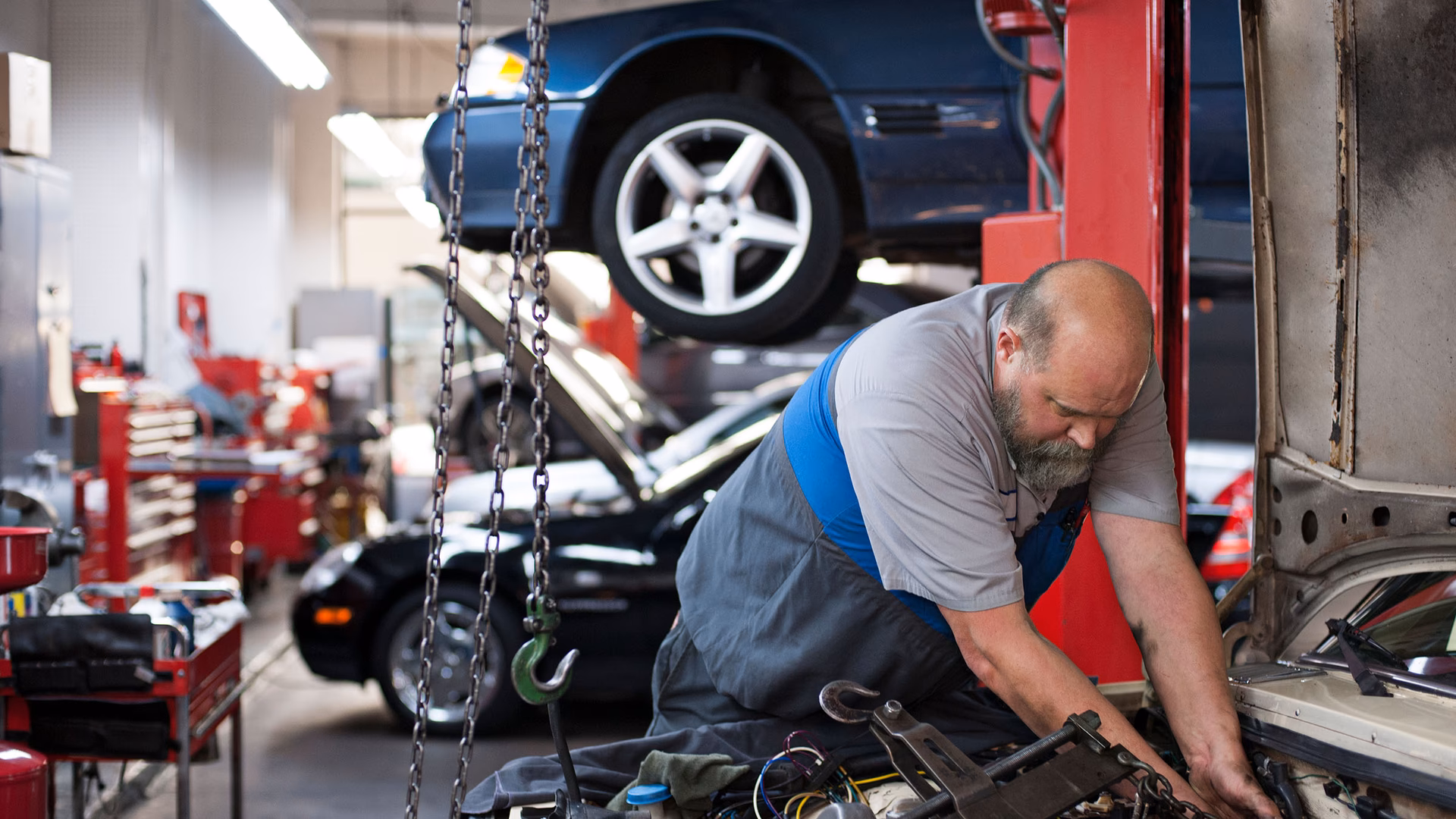 Can I use a specific shop to repair my car?