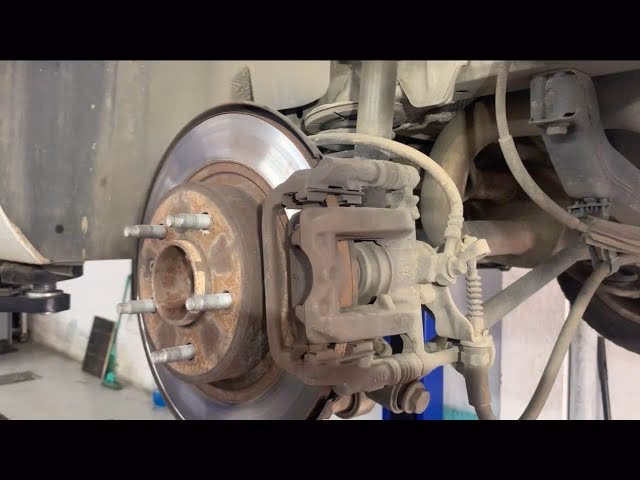 How do I adjust the handbrake on my Astra-J?