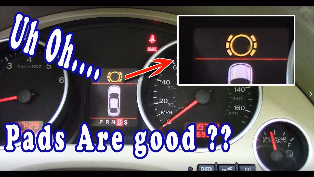 Why is my 2009 Audi A5 brake pad sensor light coming on?