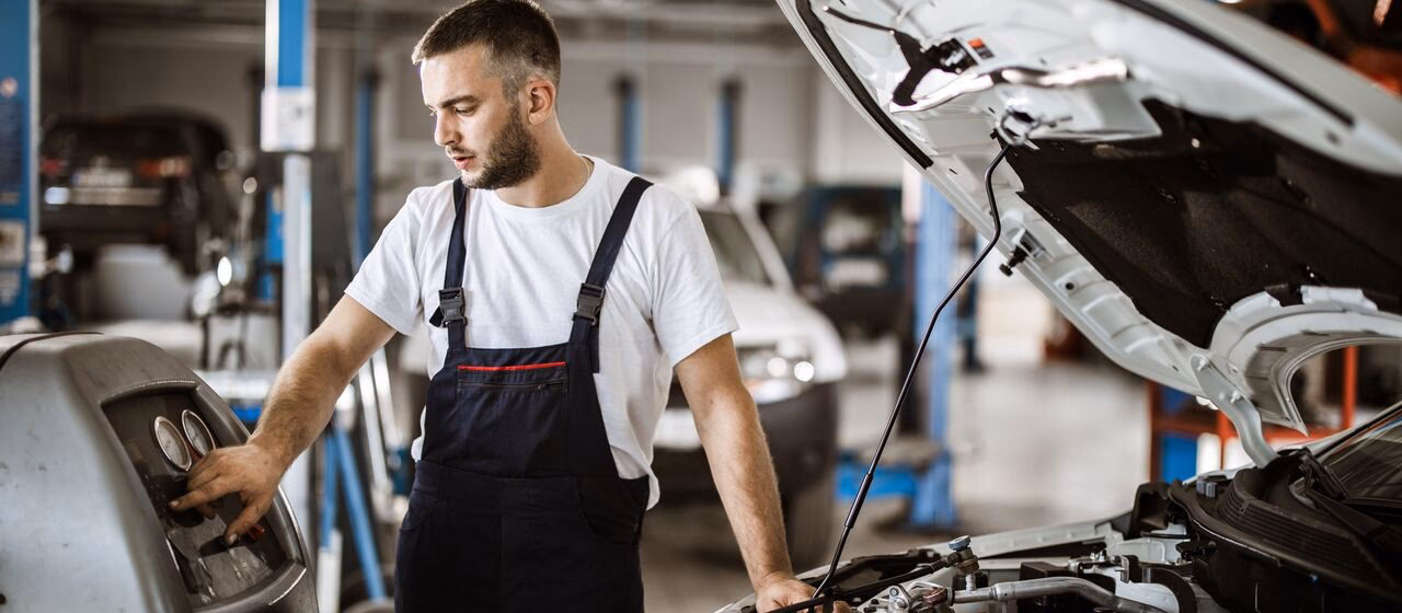 What happens if a car is stolen by an AXA motor engineer?