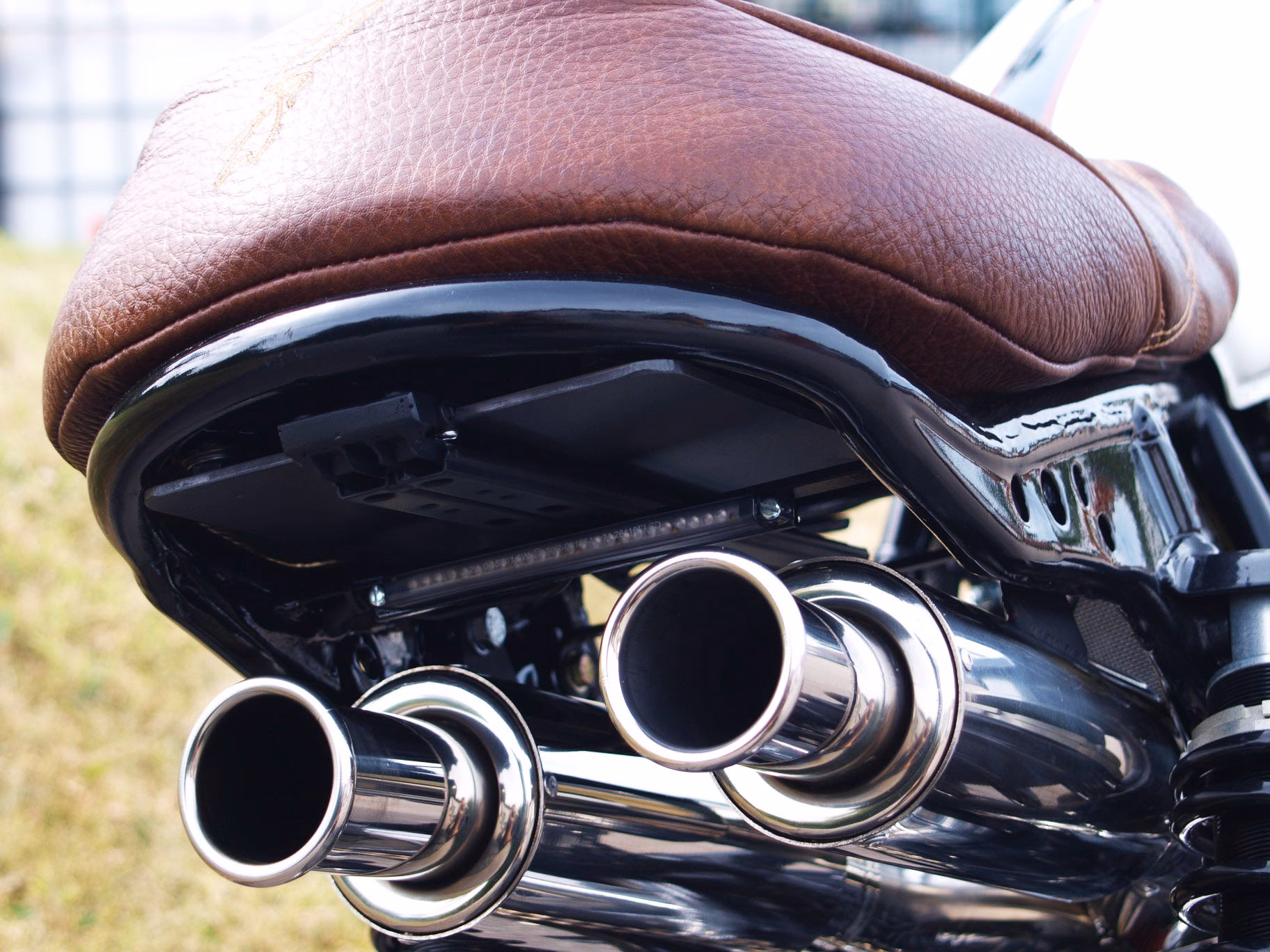 What types of motorcycles can a custom exhaust system fit?