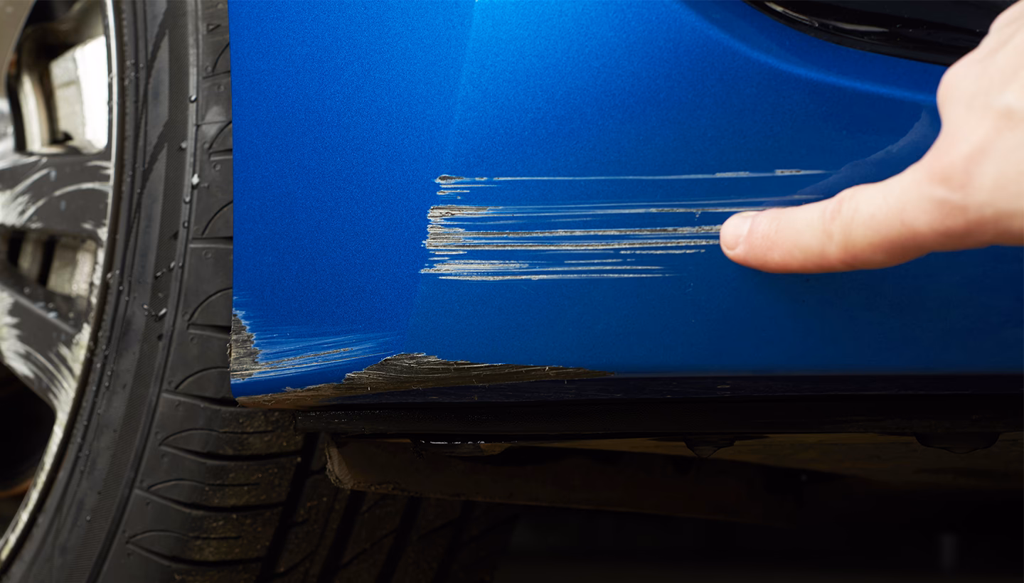 How do you fix a car paint scratch?