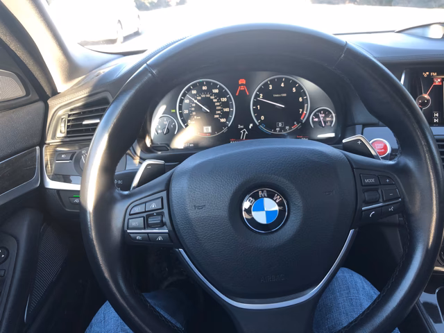 How do I adjust the steering angle of my BMW?
