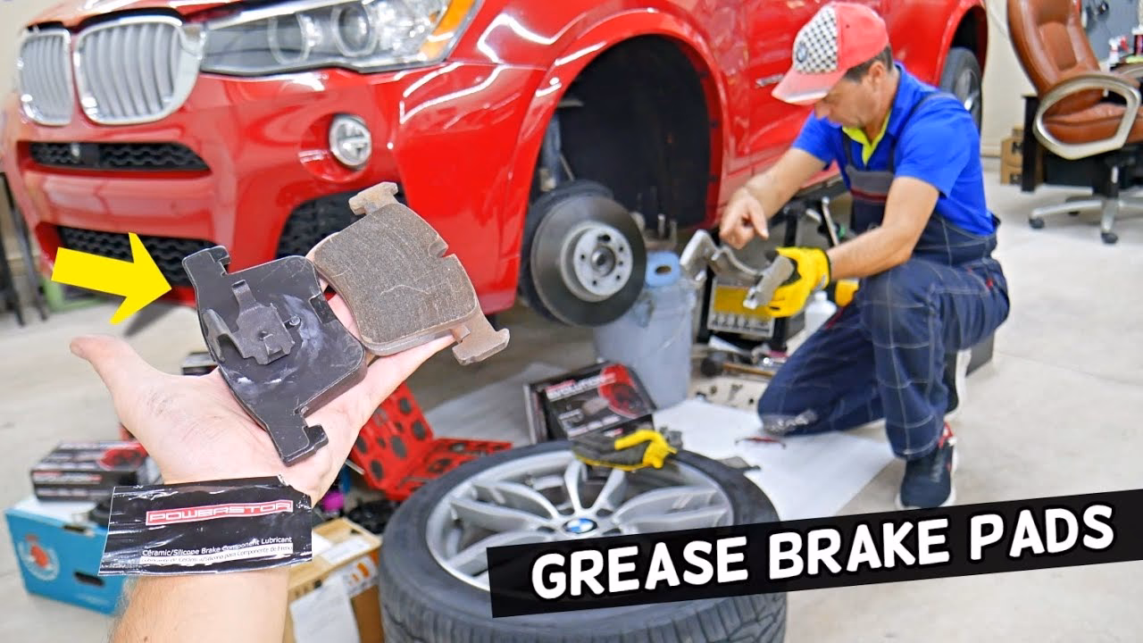 How do brake pads work on a BMW?
