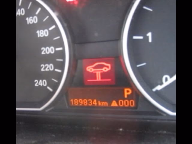 What causes a red car on a lift symbol?