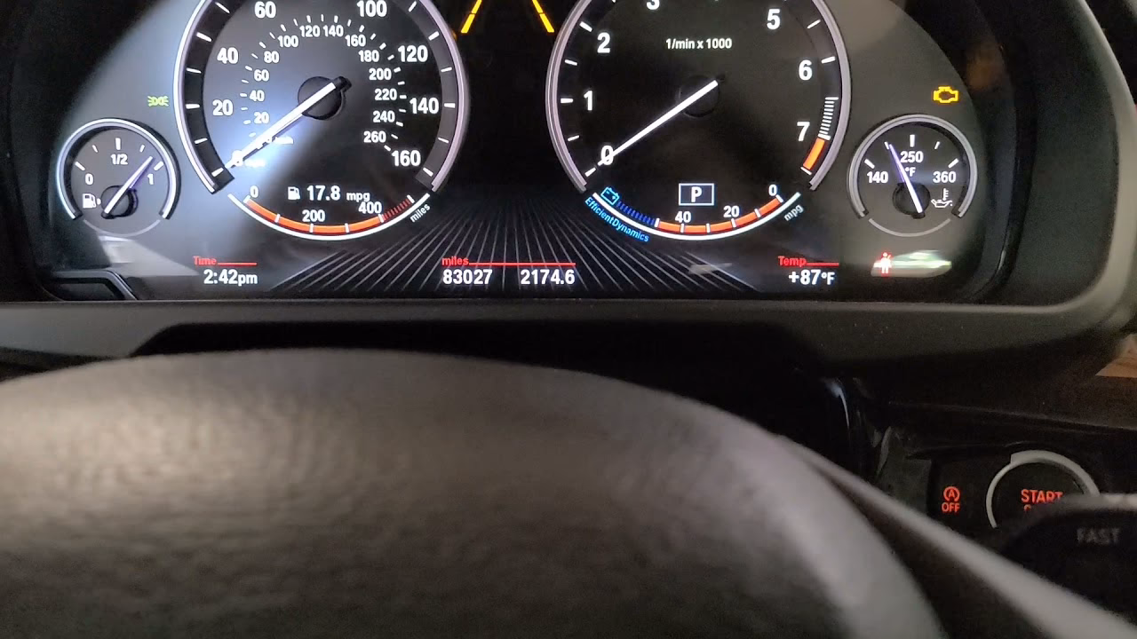 How do I reset the oil service light on my BMW X5?