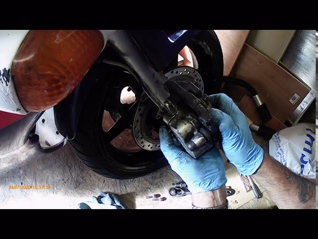 What should I avoid when removing the brake hose bolt?