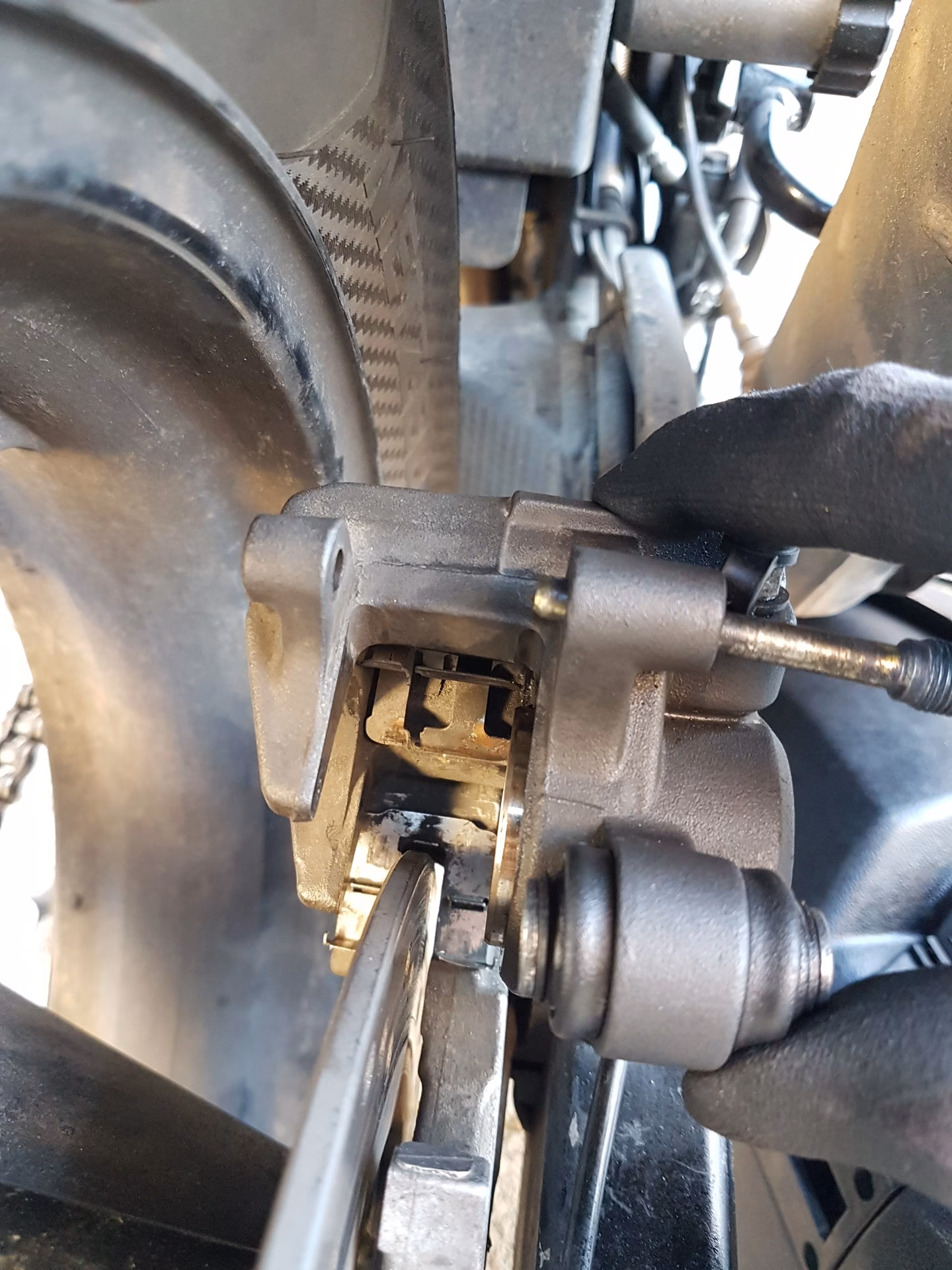 How do I know if my brake caliper is bad?