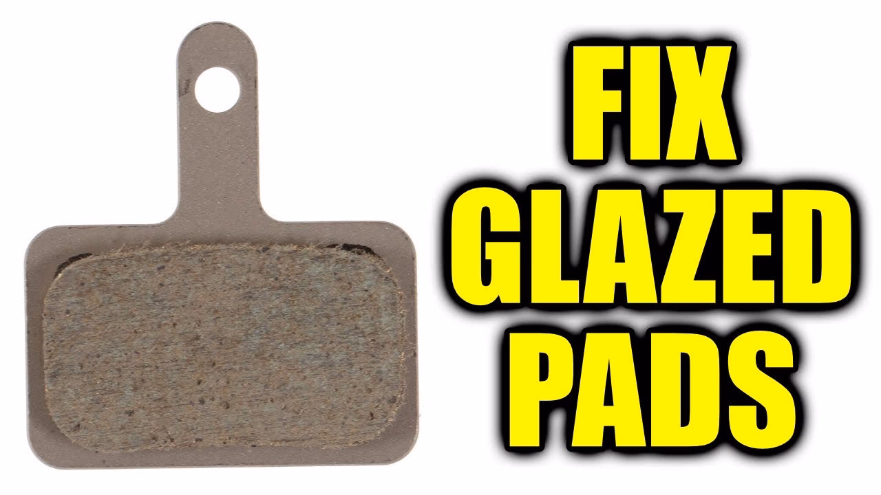 Should brake pads be glazed during a race?