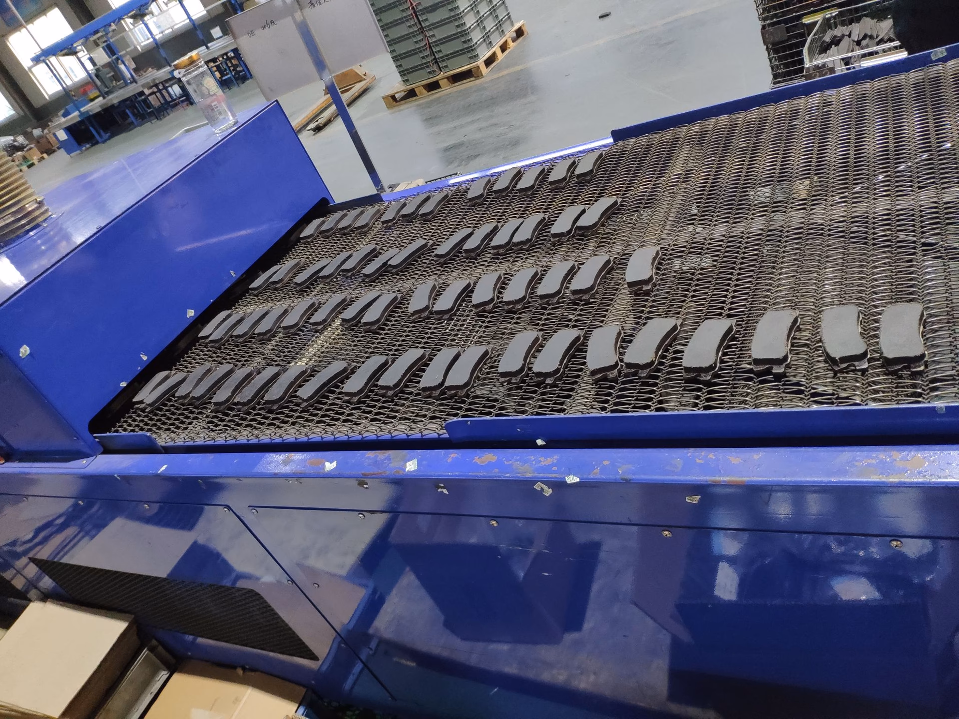 How do brake pads become solid in the production process?