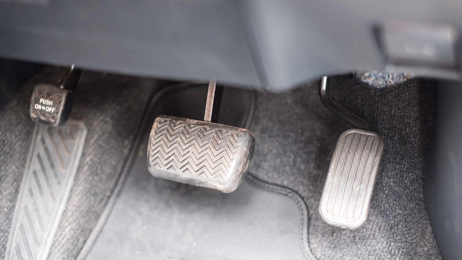 Why does my brake pedal feel hard to push?