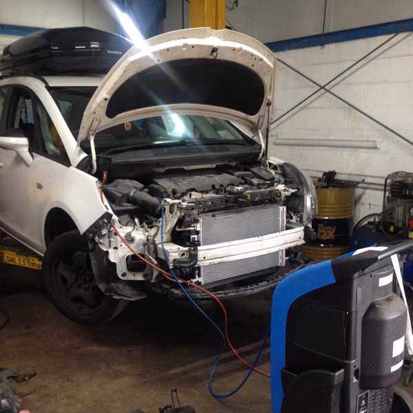 Does air conditioning help a car in winter?