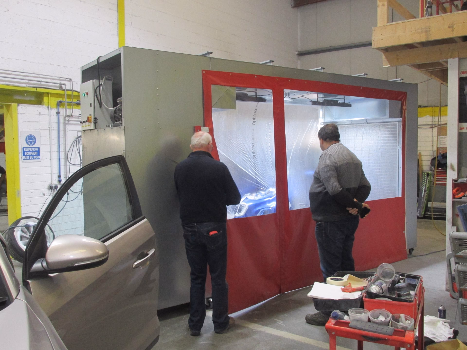 Where is auto body repairs located?