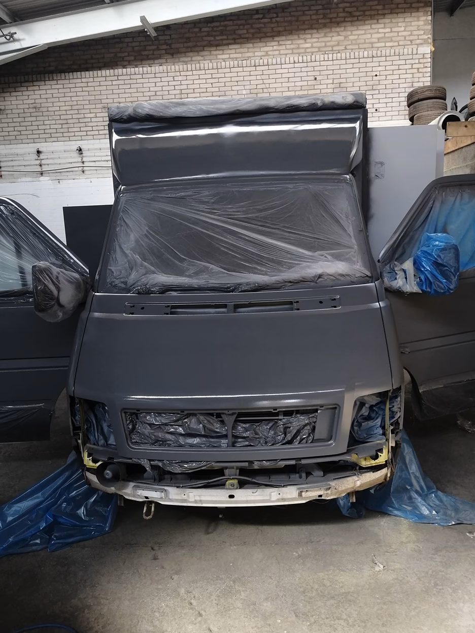 What services does the car body shop offer?