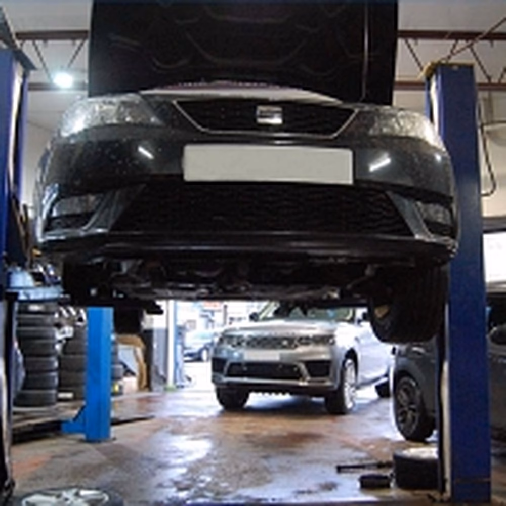 What services does a car paint & bodywork repair service offer?
