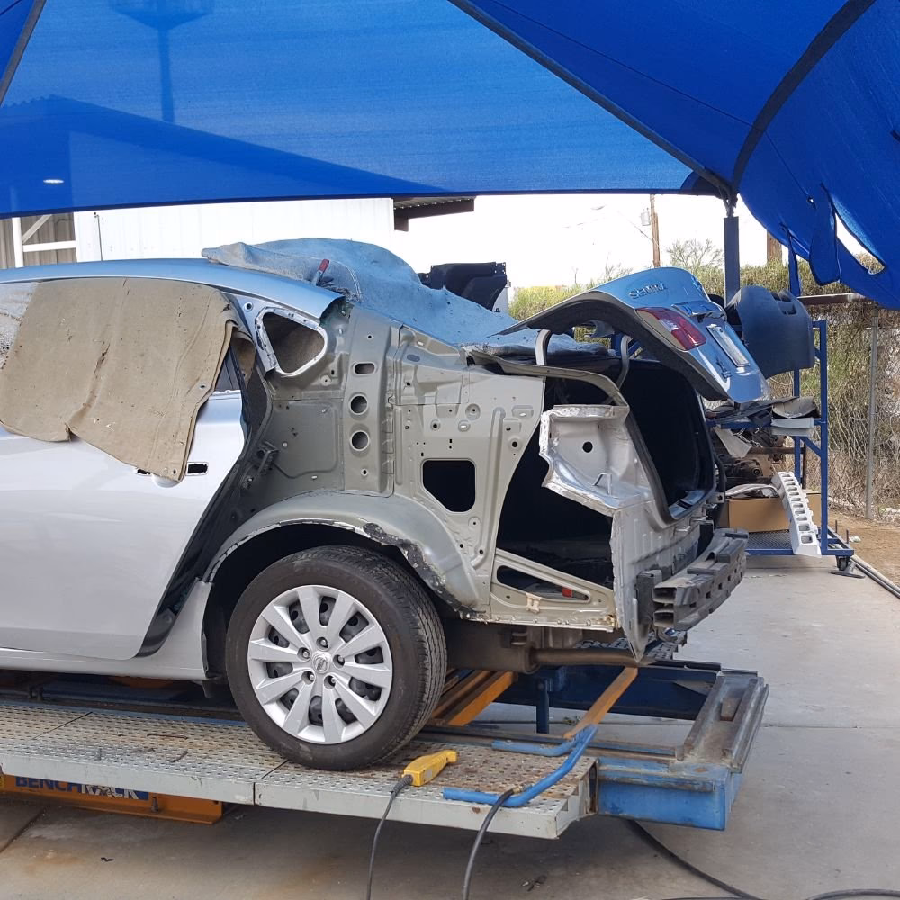 Does Scottsdale collision center repair a BMW?