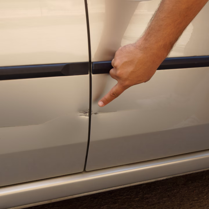 How do you fix a dents on a car?