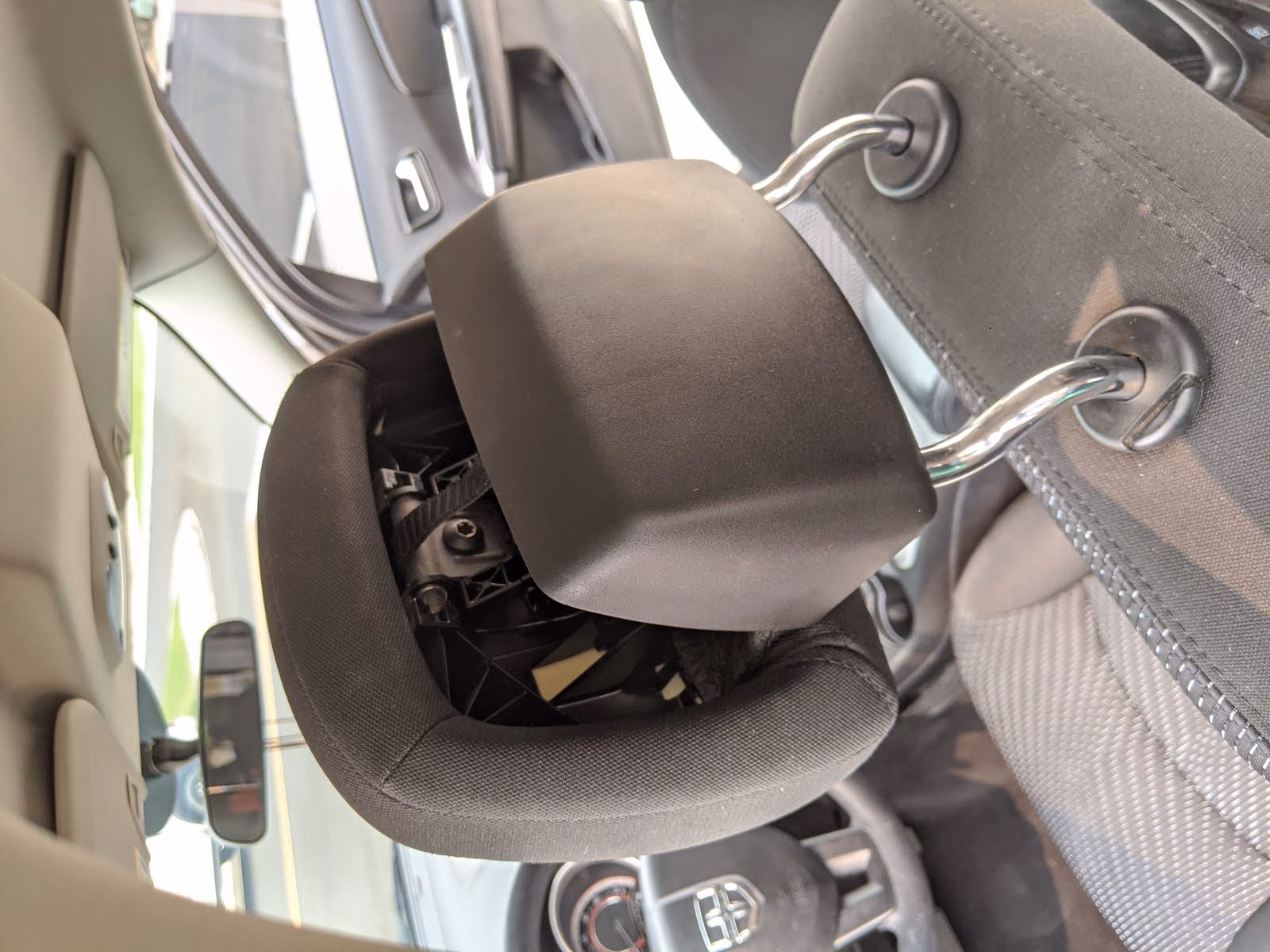 How does a car headrest work?