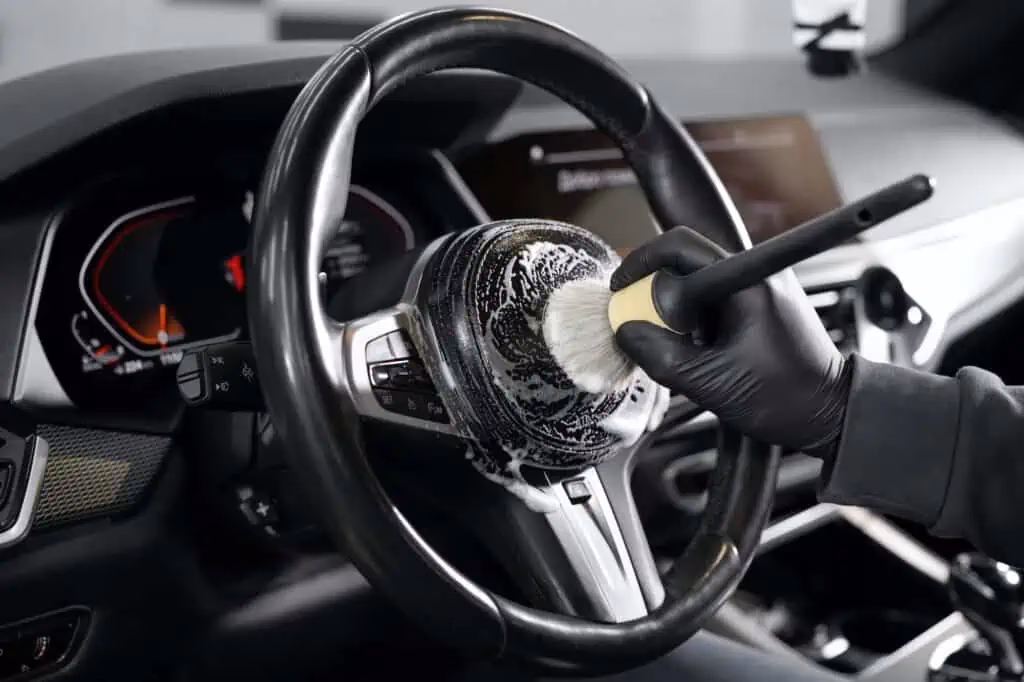 How do you clean a new car?