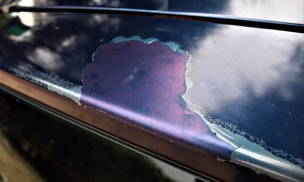 How do you flatten automotive paint?
