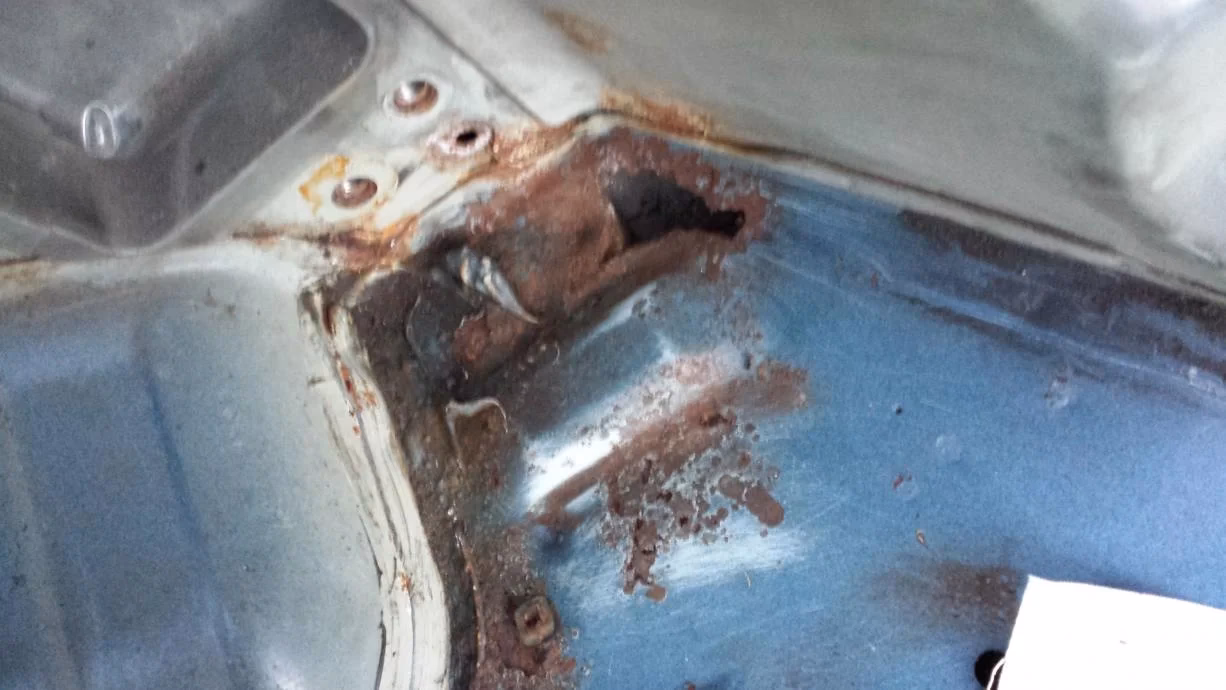 How do you fix a rust hole in an aluminum surface?