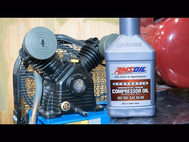 How do you remove oil from a compressor?