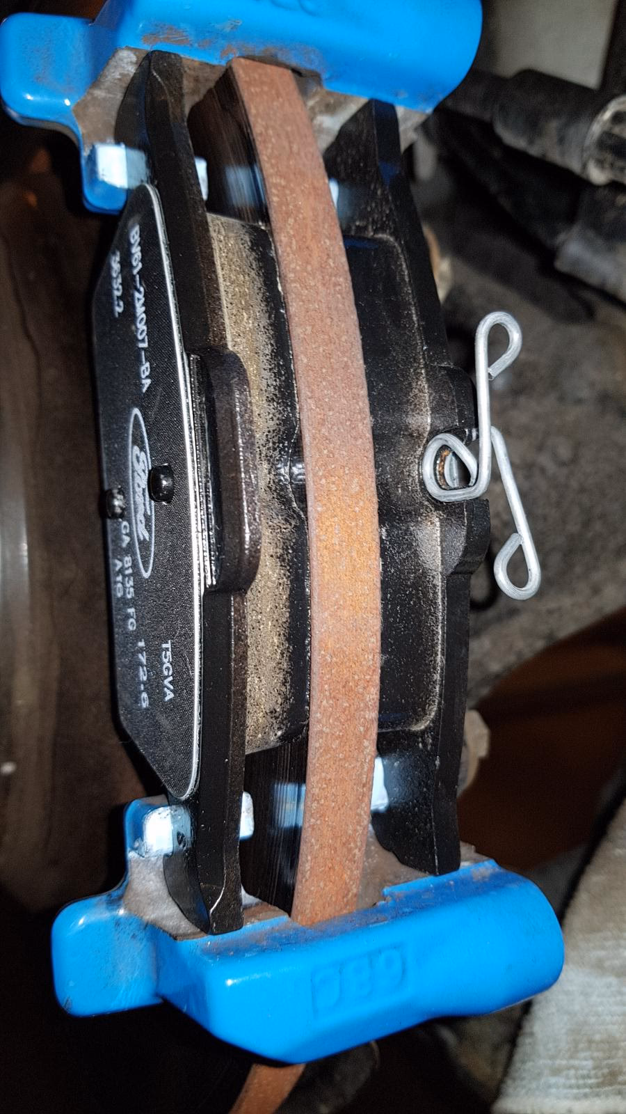 How do I fix a squealing brake pad?