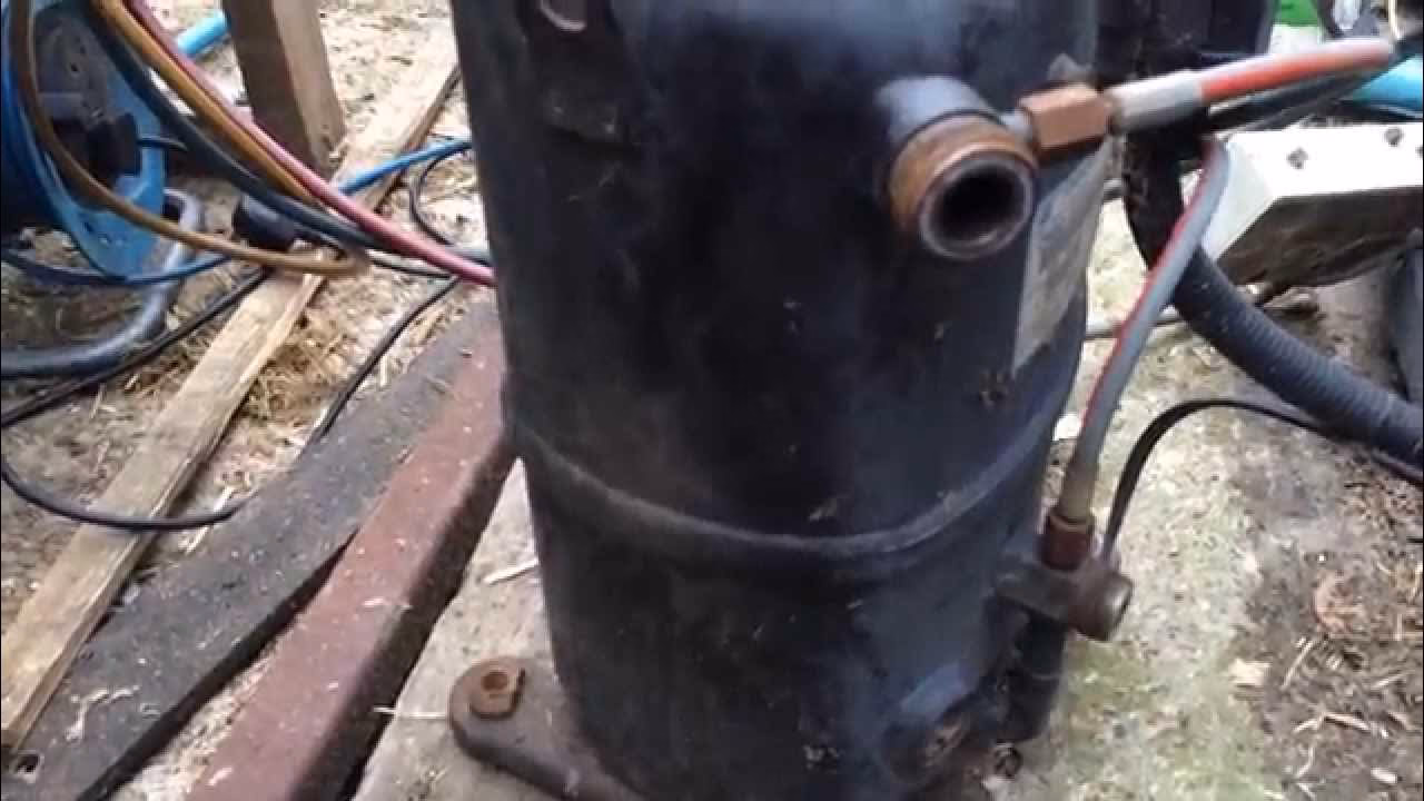 How to check the rotation of a scroll compressor?