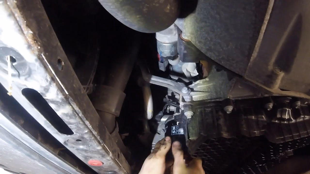 How do you change transmission oil on a Ford Mondeo?