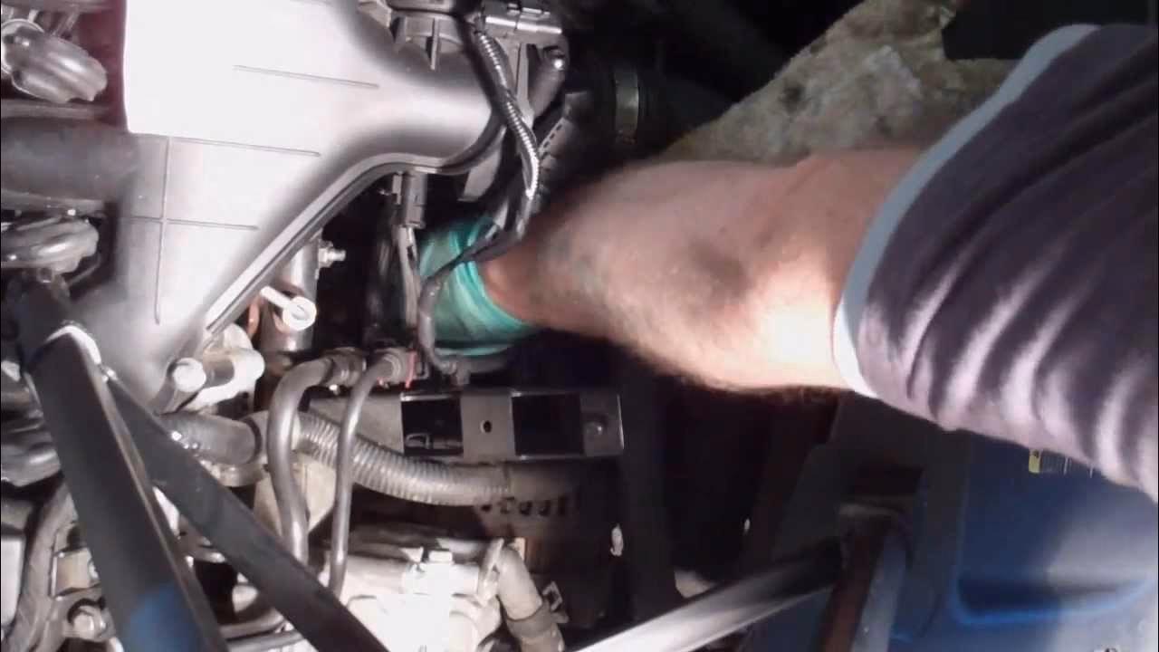 How do you change transmission oil on a Ford Mondeo?