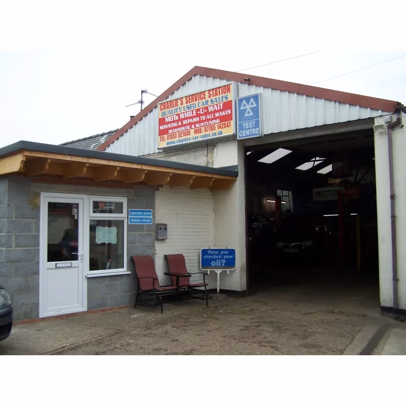 How do I book An MOT at Charlies service station?