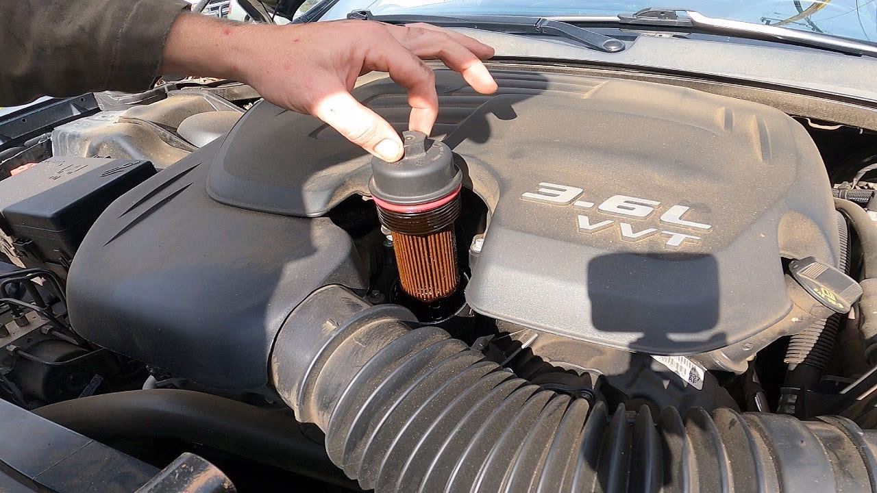 How do you replace an engine oil filter?