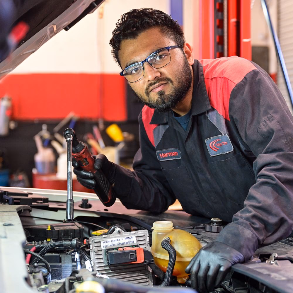 What should I do if a car garage is leaking oil?