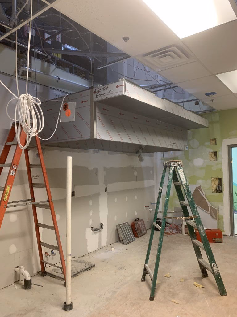 How do I choose the right commercial exhaust hood?