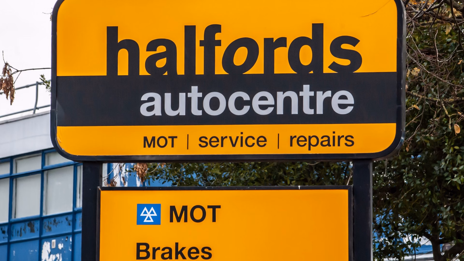 How can Halfords Autocentres help employees save money?