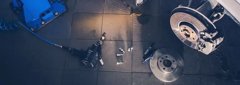 How to put new brake pads in place for BMW 5 Series?