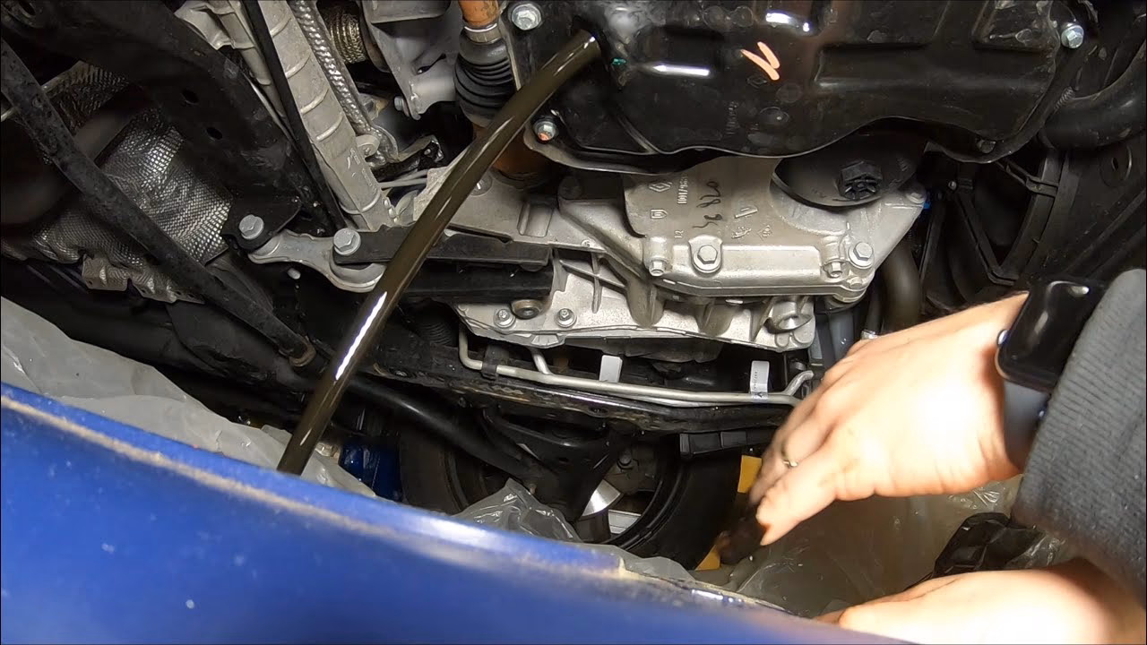 How do I remove oil from my gearbox?