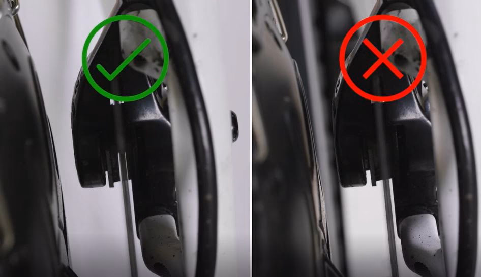 What causes brake pads to stick to the disc?