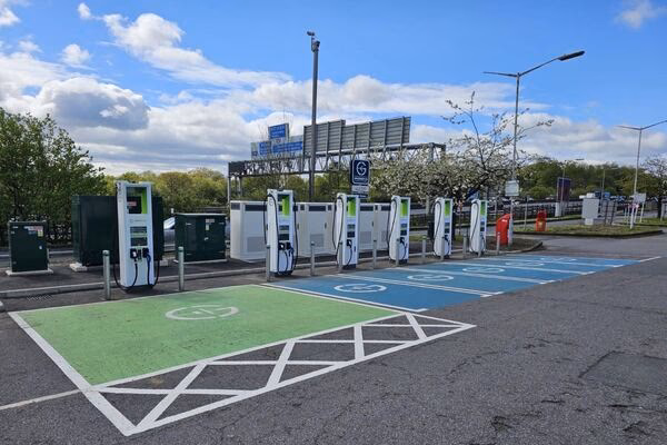 Who provides motorway charging points in the UK?