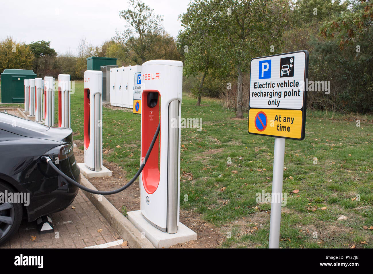 Who provides motorway charging points in the UK?