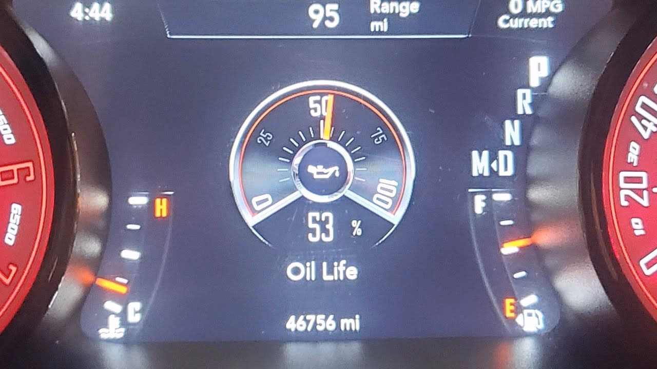 How do I reset the oil life on my Dodge Challenger?