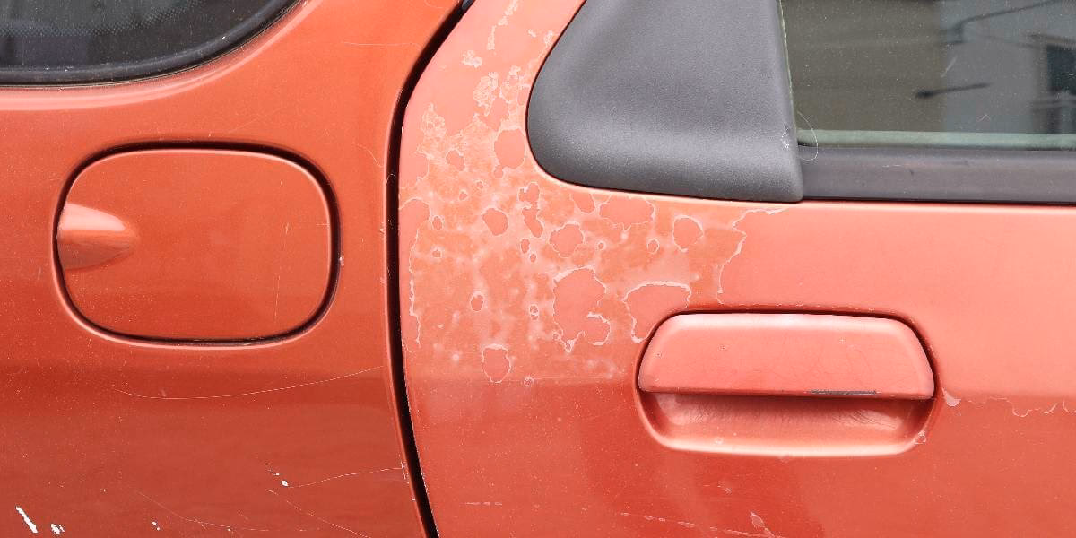 Does water leave spots on car paint?