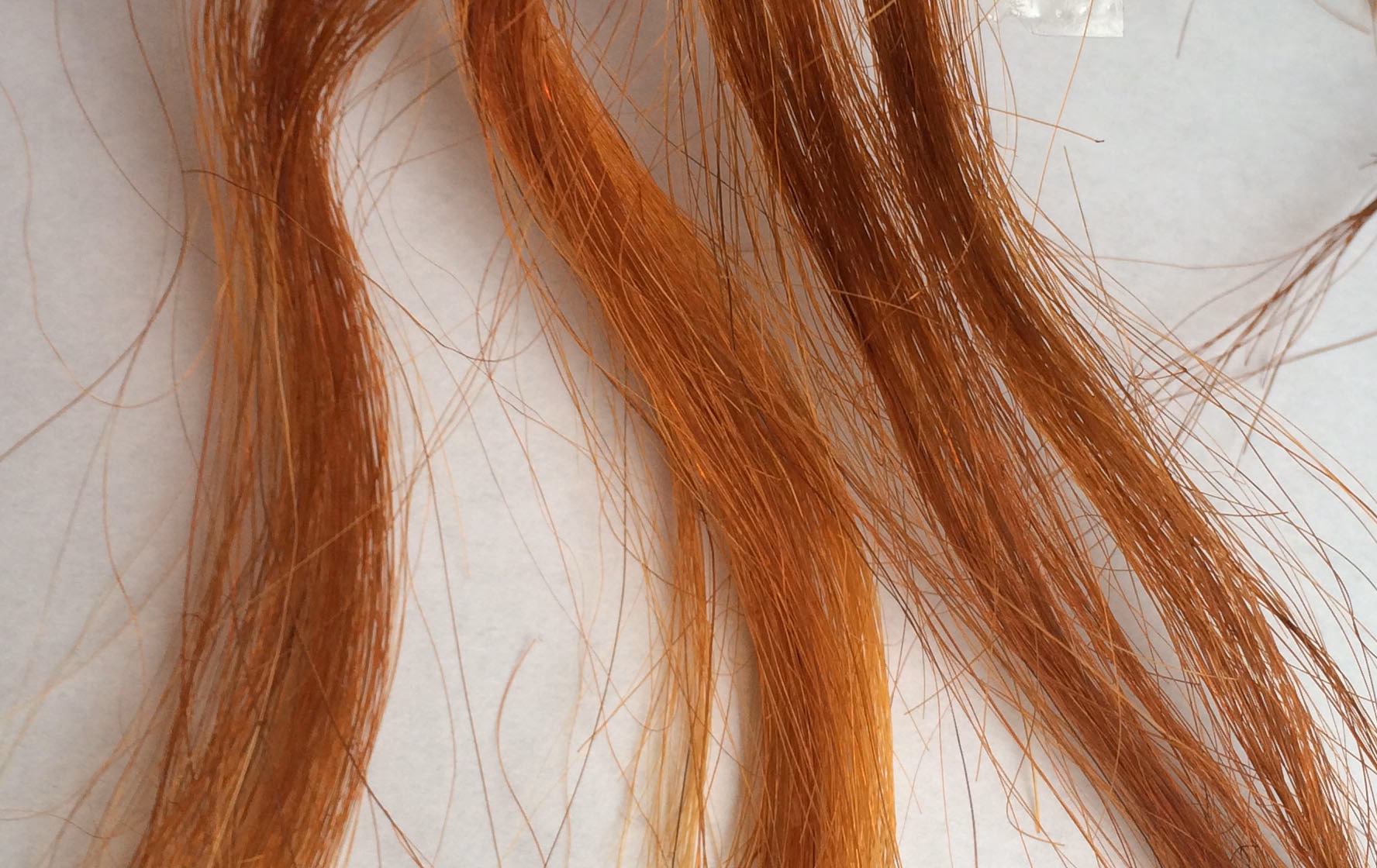 Does coconut oil make hair dye fade?