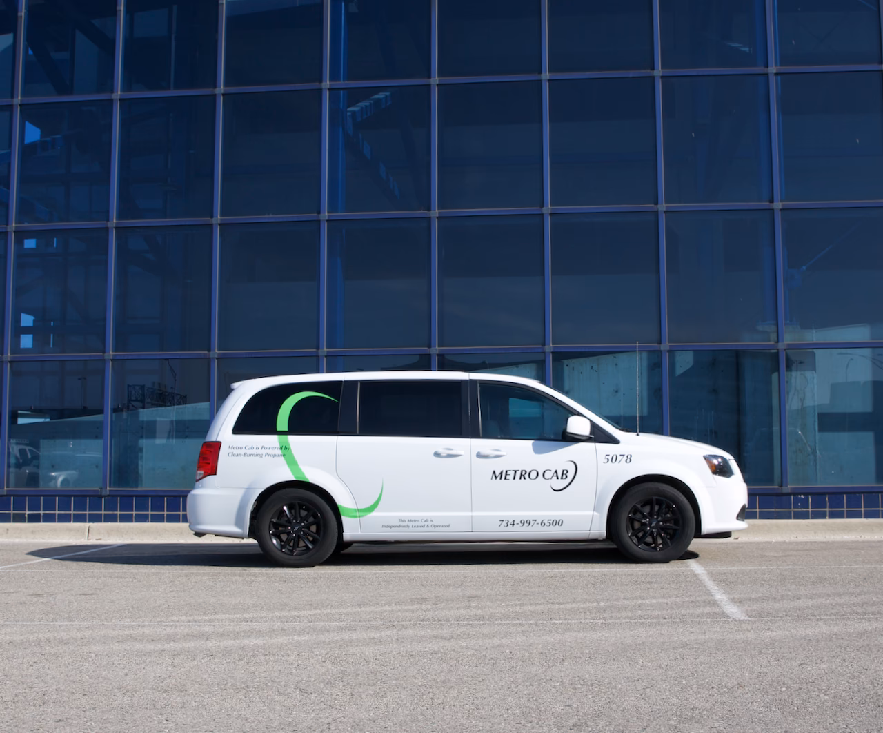 Where can I get a taxi at Detroit Metro Airport?