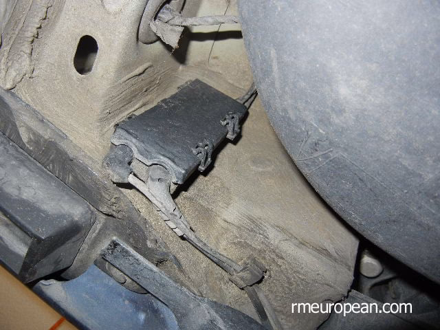 How do I remove the brake caliper wear sensor?