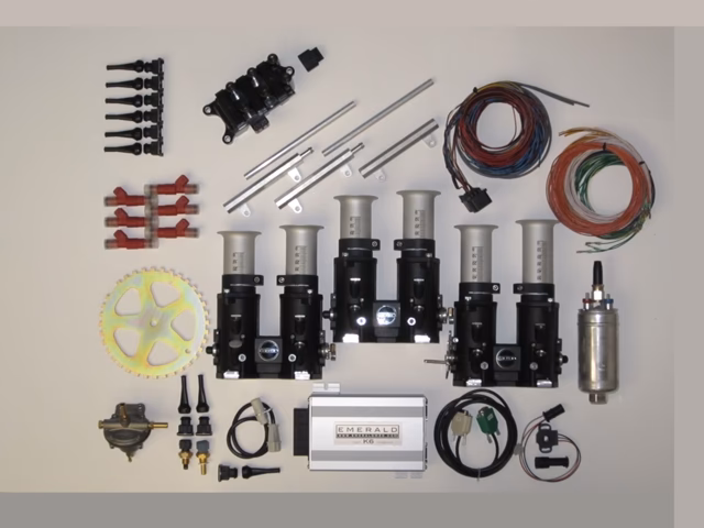 What is emerald K6+ engine management system?