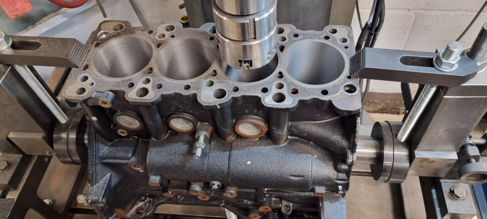 Who are engine re-manufacturers?