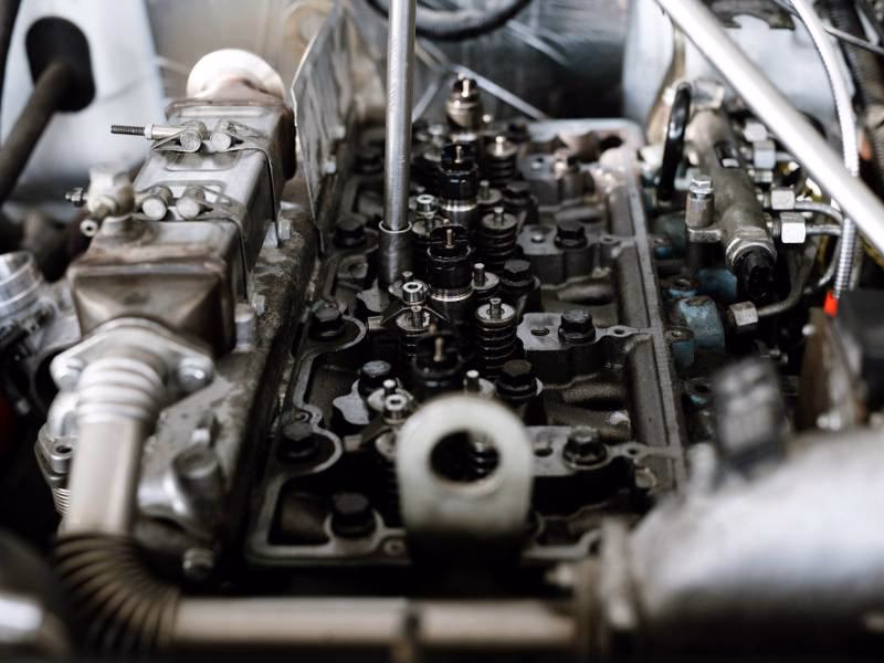What services do you offer for cylinder head repair?