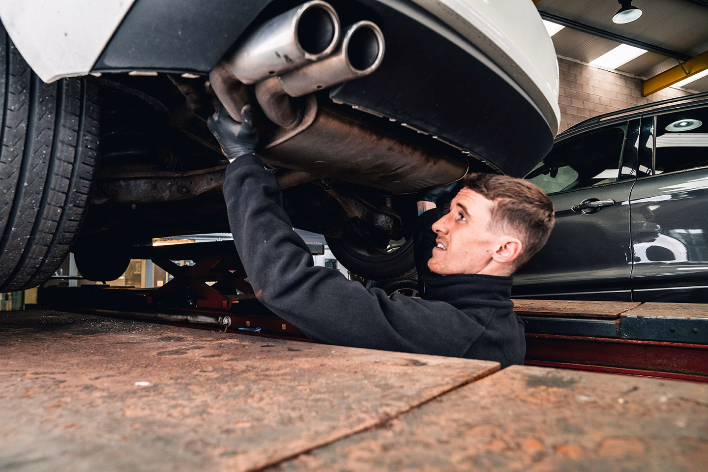 What services does a bespoke exhaust system offer?