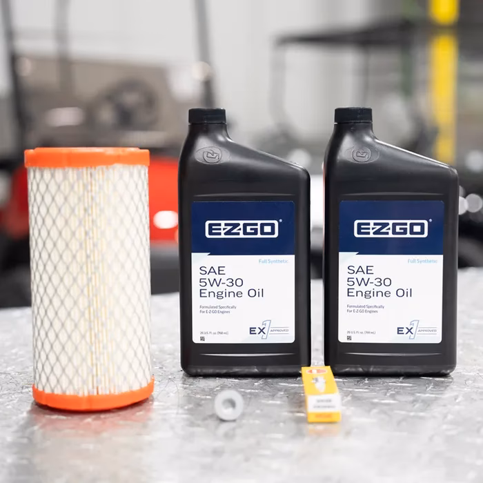 How often should EZ GO golf cart oil be changed?